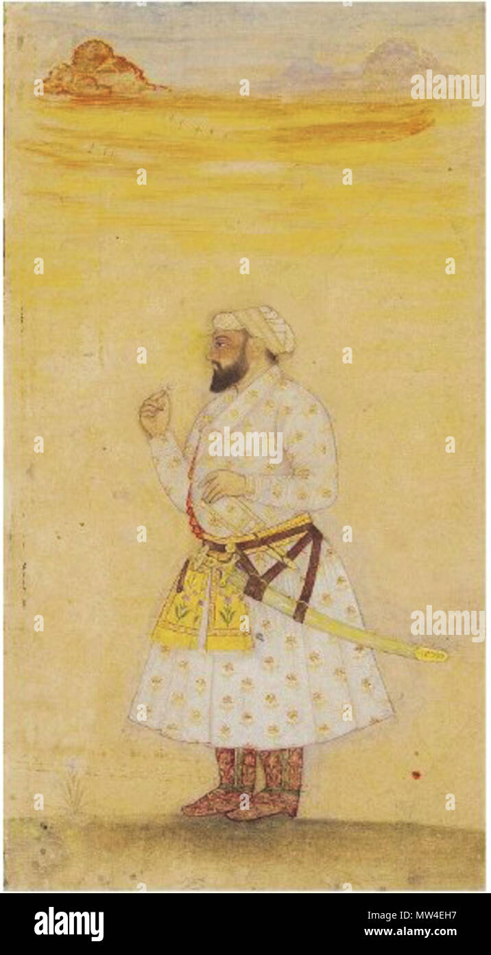 . Englisch: Menge Beschreibung Guru Teg Bahadur, DER NEUNTE SIKH GURU MUGHAL INDIA, 18. Jahrhundert Gouache erhöhte mit Gold auf Papier, einem einzigen turbanned Gestalt mit eleganten weißen Roben mit floralen Beleuchtung steht auf einem grasbewachsenen Hügel bei Sonnenuntergang, eine Hand hält ein kleines Juwel, das andere liegt auf der Griff eines Katar, einem langen Schwert auch hängt von seinem Gürtel, festgelegt in Gold beleuchtet Creme Grenzen, kleine Bereiche der Färbung, montiert Miniatur 8 x 4 in. (20,2 x 11,4 cm.); Folio 10 1/8 x 6 5/8 in. (25,3 x 16,6 cm.). 18. MUGHAL INDIA, 18. Jahrhundert 258 Guru Teg Bahadur Stockfoto