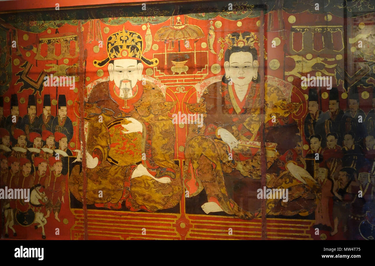 . Englisch: Im 19. Jahrhundert Vietnam Bildende Kunst hatten zwei unterschiedliche Tendenzen: Die Königliche Kunst und der Volkskunst. Der Malerei Kaiser Lý Nam Đế und die Kaiserin ist der königlichen Tendenz zeigt, wie die Leute geehrt Kaiser Lý Nam Đế. 19. Original Künstler Unbekannt 340 König Ly Nam De und die Königin, Thai Binh in der Provinz, 18. Jahrhundert AD, lackiertem Holz - Vietnam National Museum der Schönen Künste - Hanoi, Vietnam - DSC 05092 Stockfoto
