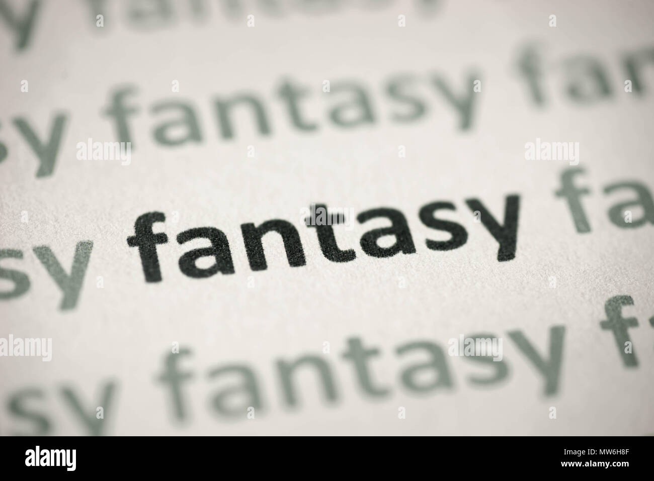 Wort fantasy auf weißem Papier Makro gedruckt Stockfoto