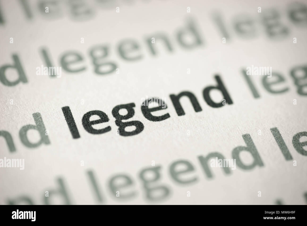 Wort legende auf weißem Papier Makro gedruckt Stockfoto