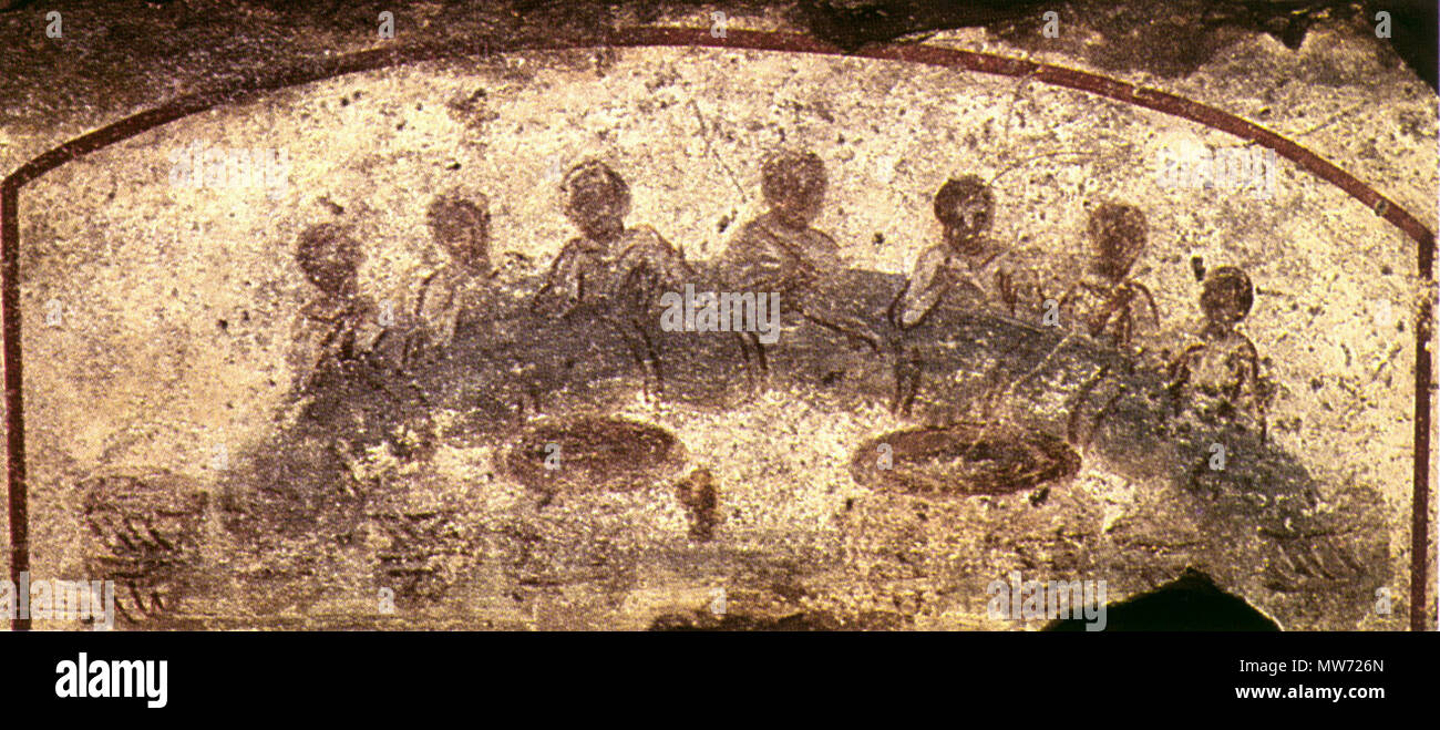 . Englisch: Gemälde von einem Fest/frühen christlichen Katakombe San Callisto (Saint Calixte Katakombe)/3.Jahrhundert/frühchristlichen Kunst English: Eucharistie wurde bei den frühen Christen in Human Grabstätten orig. als sterben sterben wundersame Vermehrung der Brote und Fische symboliziert (Joh. 6, 1-15), bei der Jesus-Leib verhiess (Joh. 6, 22-59). Stets Artikel sieben (d.h. zum Heil) berufene Personen um einen Tisch. Auf dem Tisch stehen zwei oder drei Platten mit Broten und Fischen, und am Boden Brotkörbe. . Diese Datei fehlt, Informationen zum Autor. 29 Agape Fest 04. Stockfoto