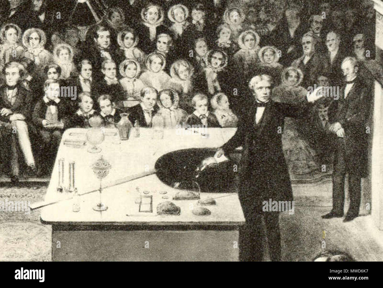 . Michael Faraday, neunzehnten Jahrhunderts Wissenschaftler und Elektriker, dargestellt von der Britischen Royal Institution Weihnachten Vortrag für Jugendliche während der Weihnachtspause der Institution im Jahre 1856. Der Künstler ist nicht bekannt. Ich würde davon ausgehen, dass diese Arbeit auch die Grundlage für die Gravur auf der 1991-93 20 Pfund Hinweis von Großbritannien (w: Bild: farady 20 poundNote.png) 202 Faraday xmas Detail Stockfoto
