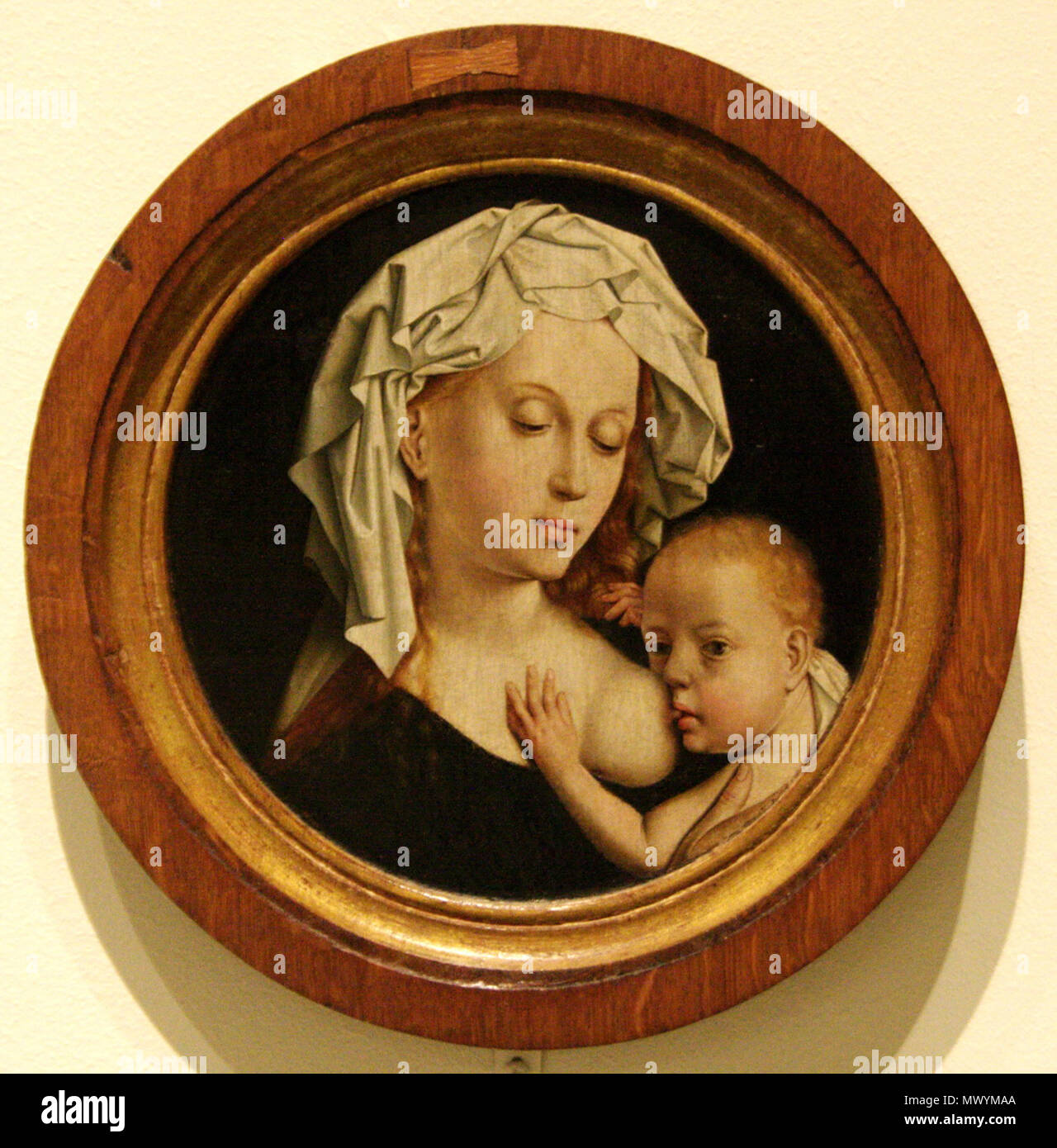 . Q 11935330. Englisch: Madonna mit Kind Workshop von Robert Campin Öl auf Leinwand, 28,4 x 12 cm (Durchmesser) Museu Nacional d'Art de Catalunya, Barcelona Català: Mare de Déu de la Llet. ca. 1520. Workshop von Robert Campin 587 höher Campin-Mare DeuLlet - MNAC -6741 Stockfoto