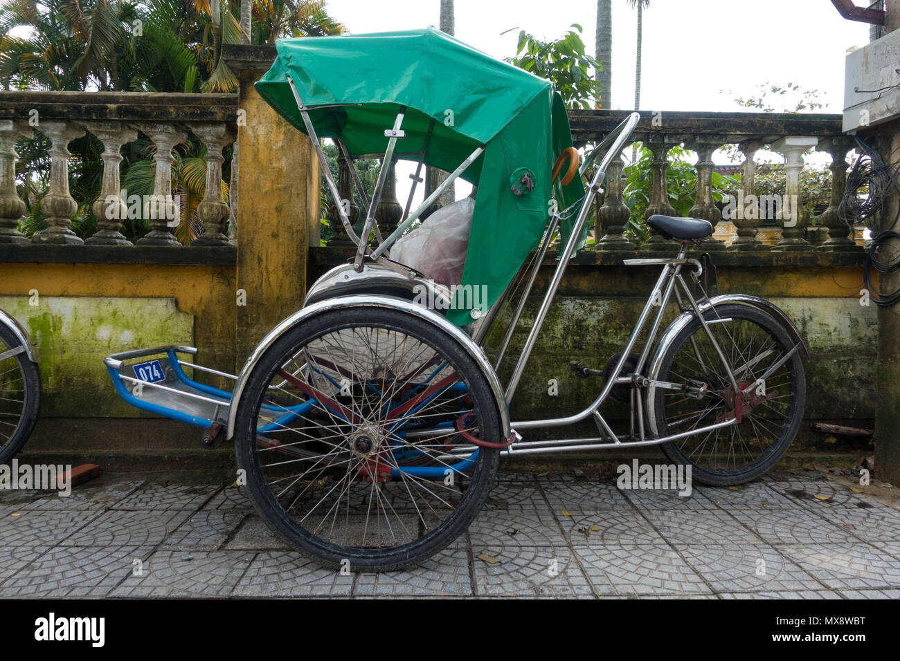 Die cyclos in Hoi An Altstadt. Stock Foto von cyclo auf Straße, Cyclo