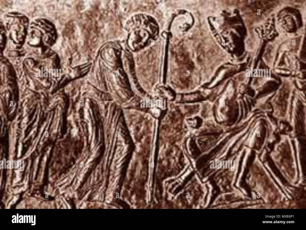 . Englisch: Otto II. ernennt einen Bischof. Deutsch: Bei der Investitur handelt es sich um die Praxis der Einweisung in ein Amt. Entscheidend für die Investitur ist die Benutzung von Symbolen, welche bei dem entsprechendne Akt überreicht werden. Die Abbildung zeigt eine typische Einsetzung von Bischöfen im frühen Mittelalter. König Otto II. setzt als weltlicher Herrscher einen Bischof in sein Amt ein und verleiht ihm als Symbole'-Ring und Stab.". Mittelalterliche. Unbekannt 460 Otto II. ernennt einen Bischof Stockfoto