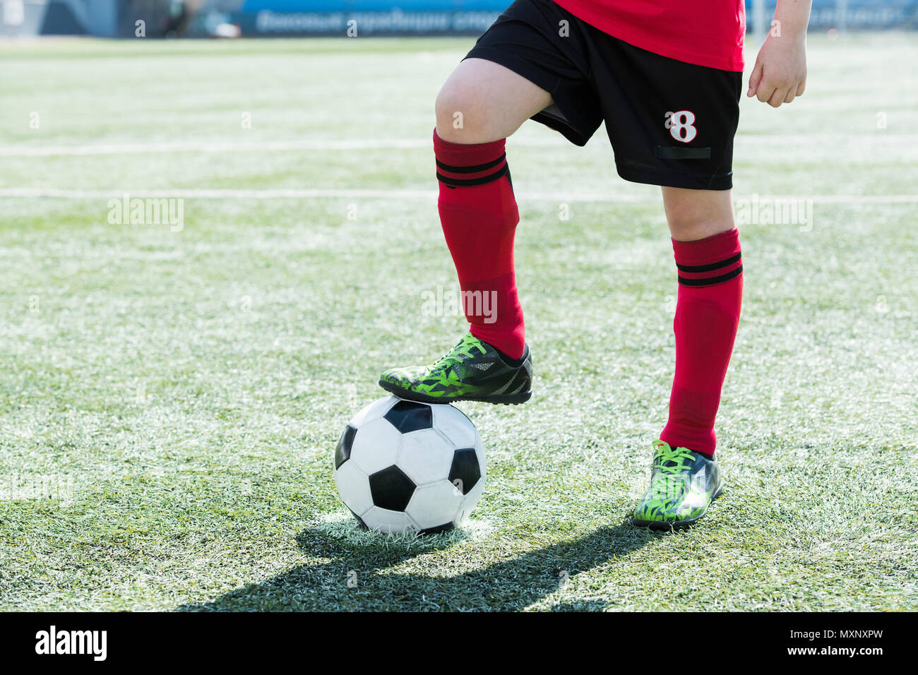Fußball-Team Captain mit Kugel Stockfoto