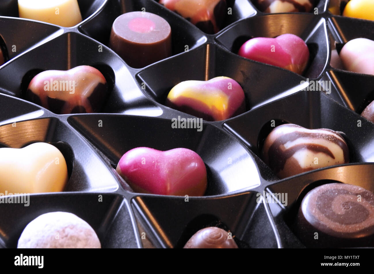 Herzförmige Pralinen Süßigkeiten Stockfoto