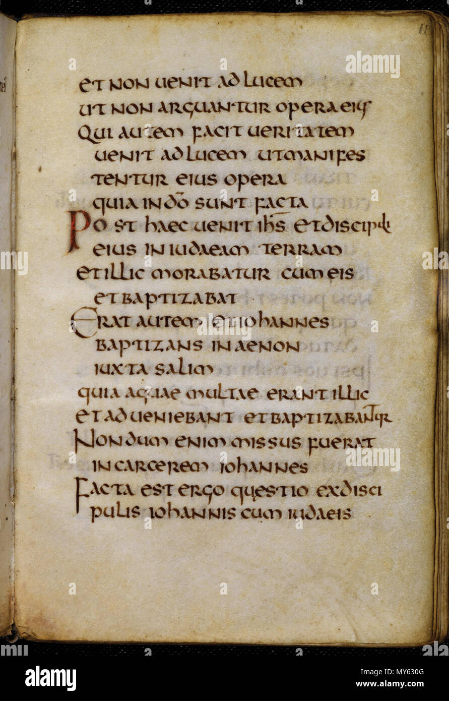 . Englisch: Seite des Evangelium des Hl. Johannes im St. Cuthbert oder Stonyhurst Gospel. Northumbrian, C. 698 British Library. 21. Februar 2011. British Library 499 St. Cuthbert Evangelium - w.11 Stockfoto