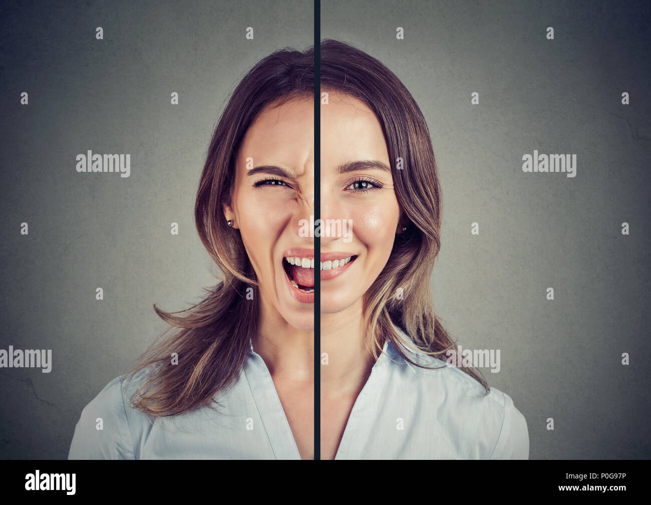 Bipolare Störung Konzept. Junge Frau mit einem Gesichtsausdruck auf grauem Hintergrund Stockfoto