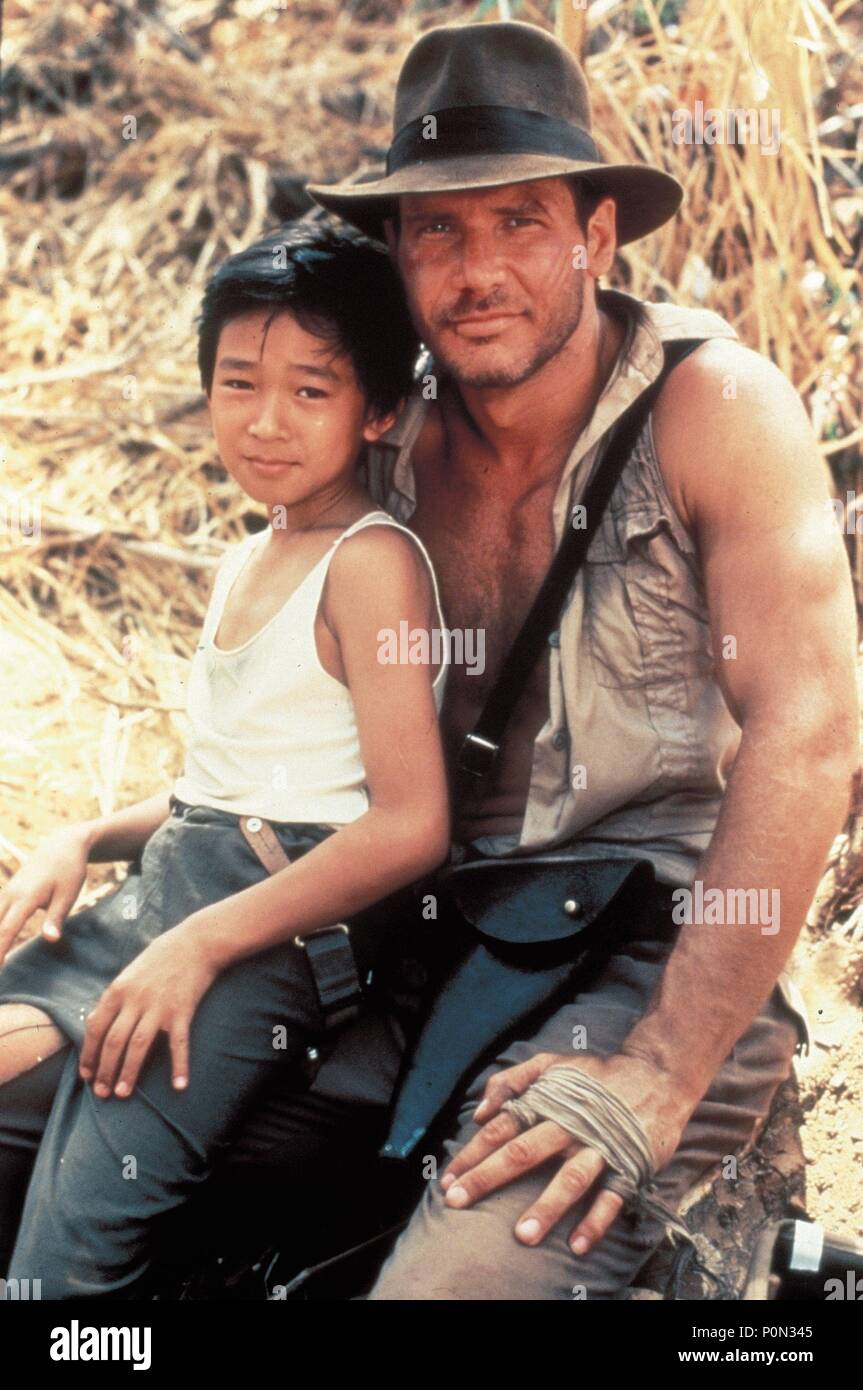 Original Film Titel: INDIANA JONES UND DER TEMPEL DES TODES. Englischer Titel: INDIANA JONES UND DER TEMPEL DES TODES. Regisseur: Steven Spielberg. Jahr: 1984. Stars: HARRISON Ford; JONATHAN KE QUAN. Credit: Lucasfilm LTD./PARAMOUNT/Album Stockfoto
