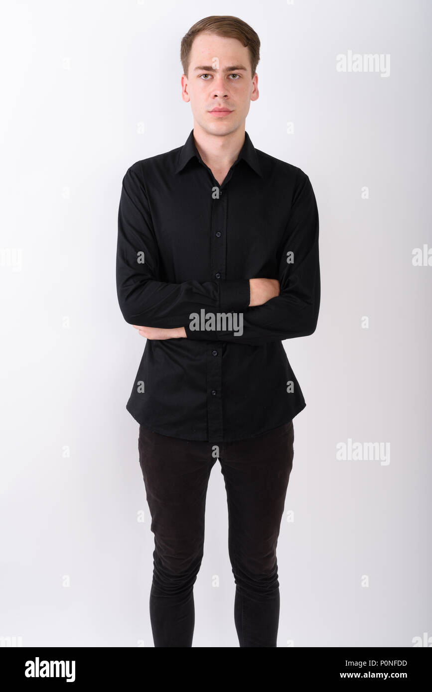 Junge gut aussehender Geschäftsmann vor weißem Hintergrund Stockfoto