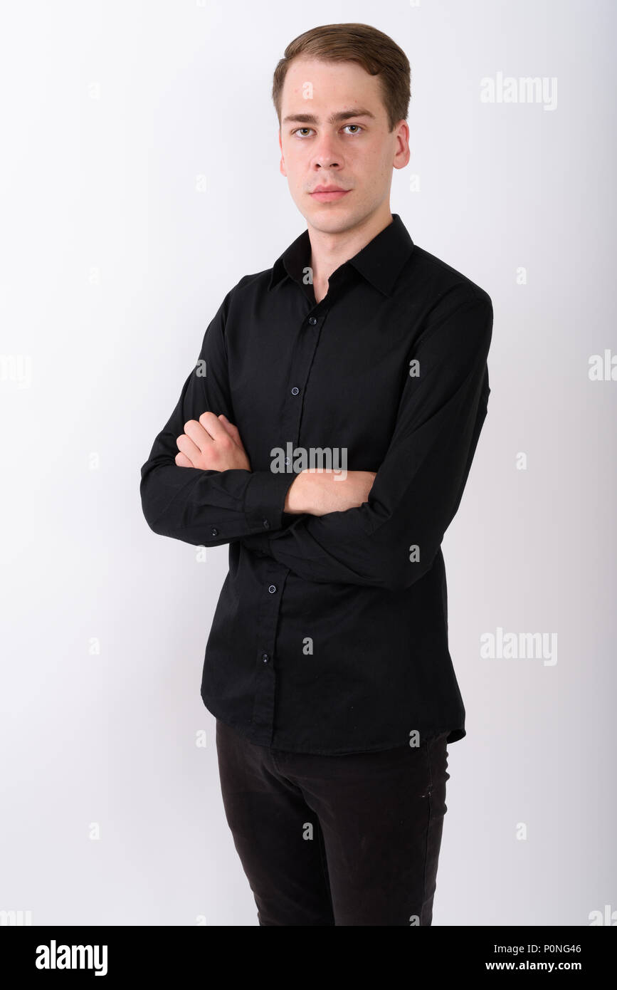 Junge gut aussehender Geschäftsmann vor weißem Hintergrund Stockfoto