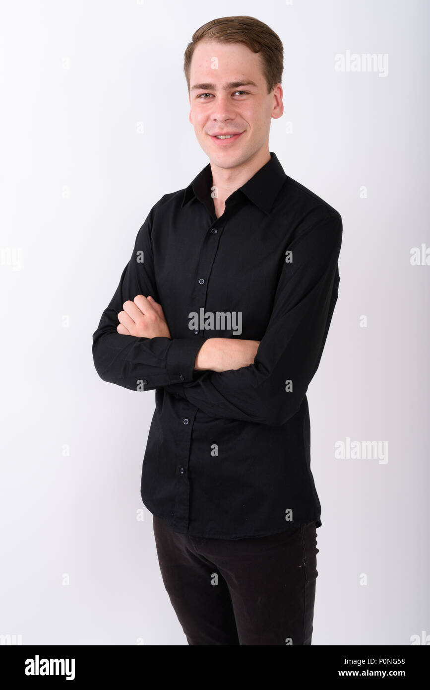 Junge gut aussehender Geschäftsmann vor weißem Hintergrund Stockfoto