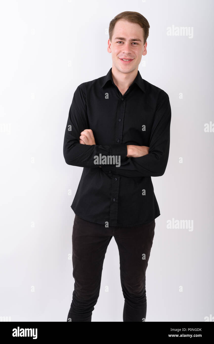 Junge gut aussehender Geschäftsmann vor weißem Hintergrund Stockfoto