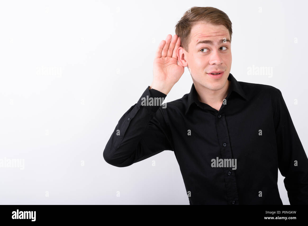 Junge gut aussehender Geschäftsmann vor weißem Hintergrund Stockfoto