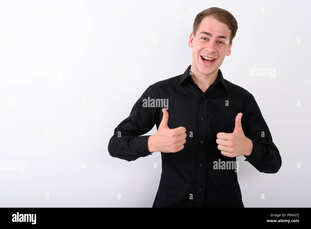 Junge gut aussehender Geschäftsmann vor weißem Hintergrund Stockfoto