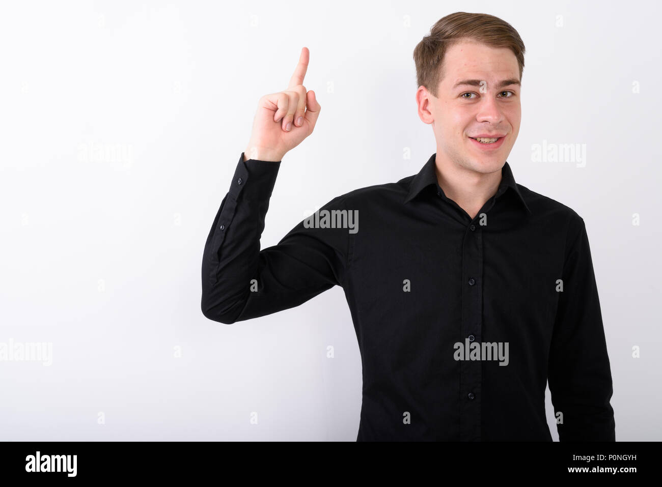 Junge gut aussehender Geschäftsmann vor weißem Hintergrund Stockfoto