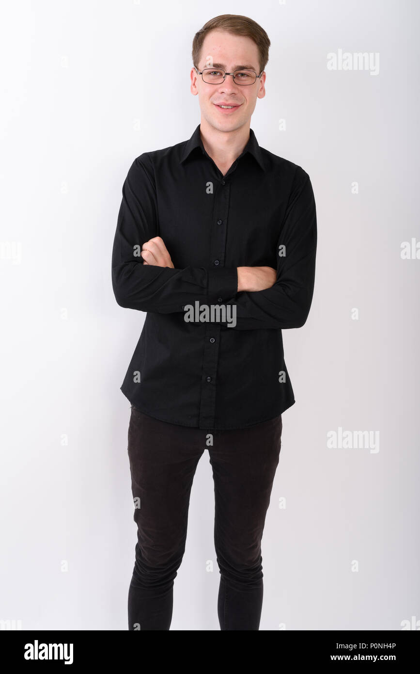 Junge gut aussehender Geschäftsmann vor weißem Hintergrund Stockfoto