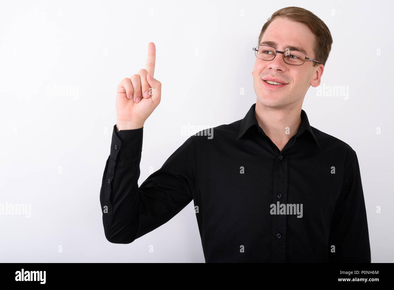 Junge gut aussehender Geschäftsmann vor weißem Hintergrund Stockfoto