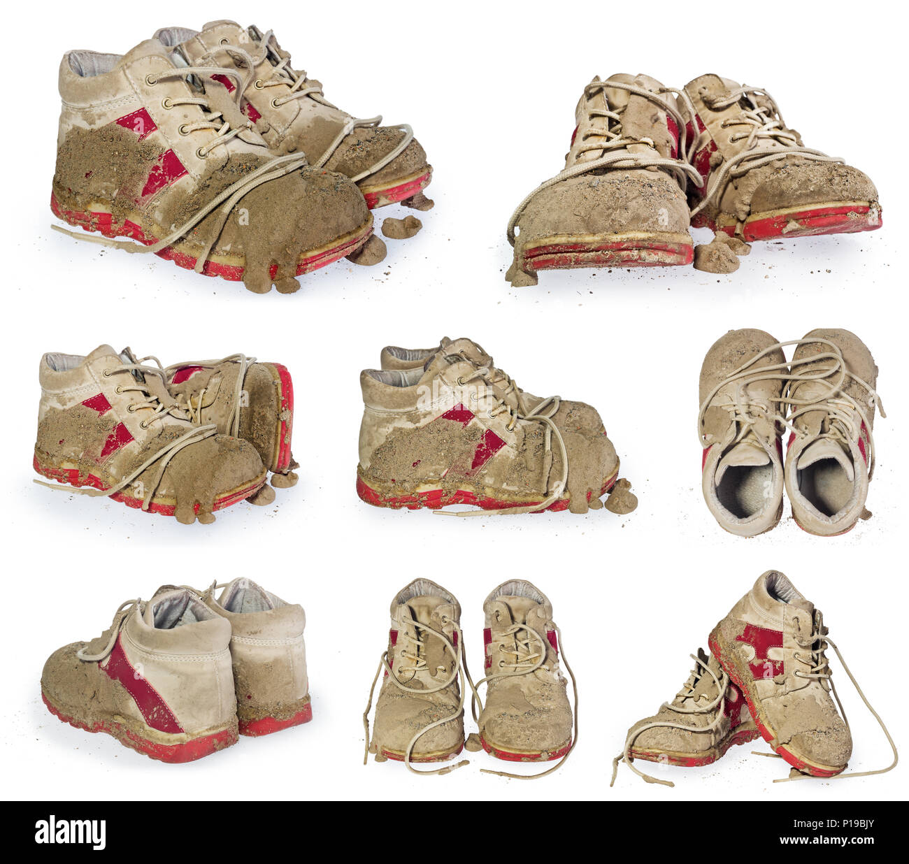 Kleine Schuhe für Kinder mit Schmutz bedeckt. Dirty Leggings für Kinderfüße in Himbeere und weiße Farbe auf weißem Hintergrund. Stockfoto