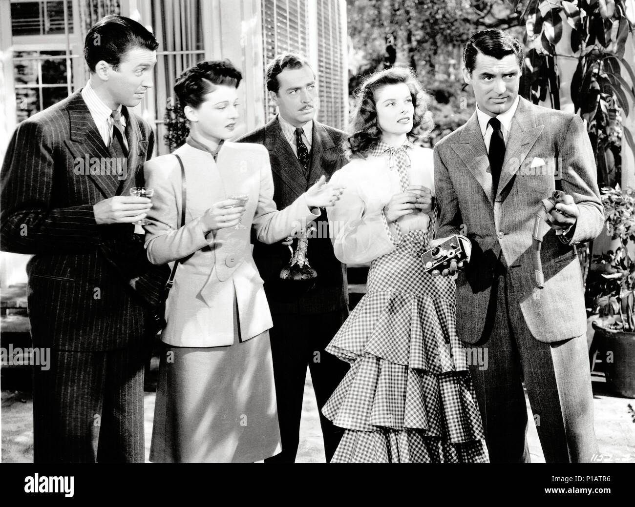 Original Film Titel: PHILADELPHIA STORY. Englischer Titel: The Philadelphia Story. Regisseur: George Cukor. Jahr: 1940. Stars: Cary Grant, James Stewart, Katharine Hepburn; John Howard; RUTH HUSSEY. Credit: M.G.M/Album Stockfoto