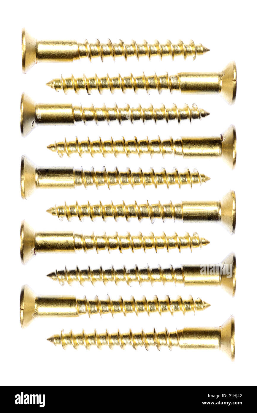 Goldene Schrauben Textur. Bau Werkzeug Ausrüstung Hintergrund. Hochformat Plakat. Stockfoto