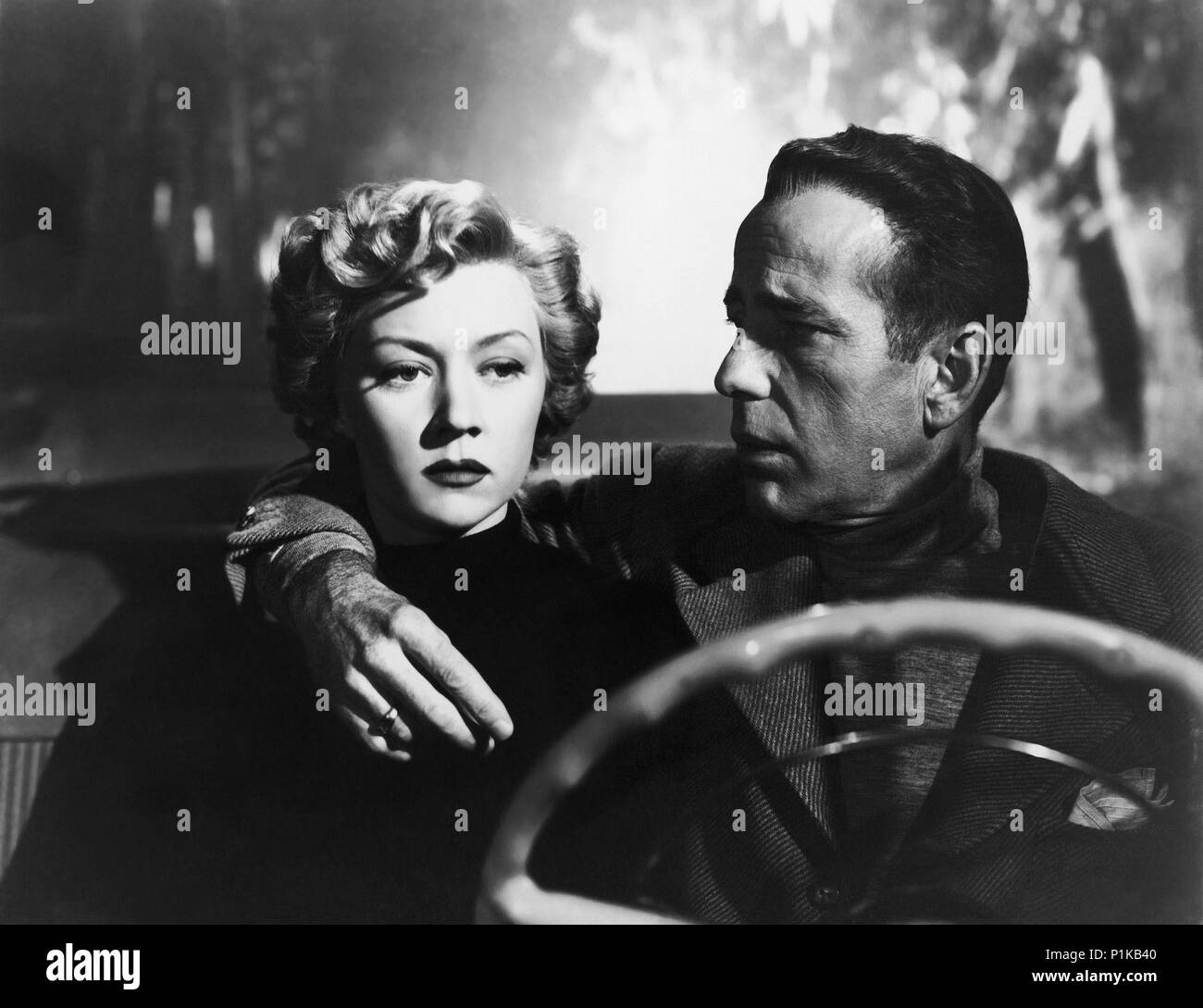 Original Film Titel: IN EINEM einsamen Ort. Englischer Titel: IN EINEM einsamen Ort. Regisseur: Nicholas Ray. Jahr: 1950. Stars: Humphrey Bogart; GLORIA GRAHAME. Quelle: Columbia Pictures/Album Stockfoto
