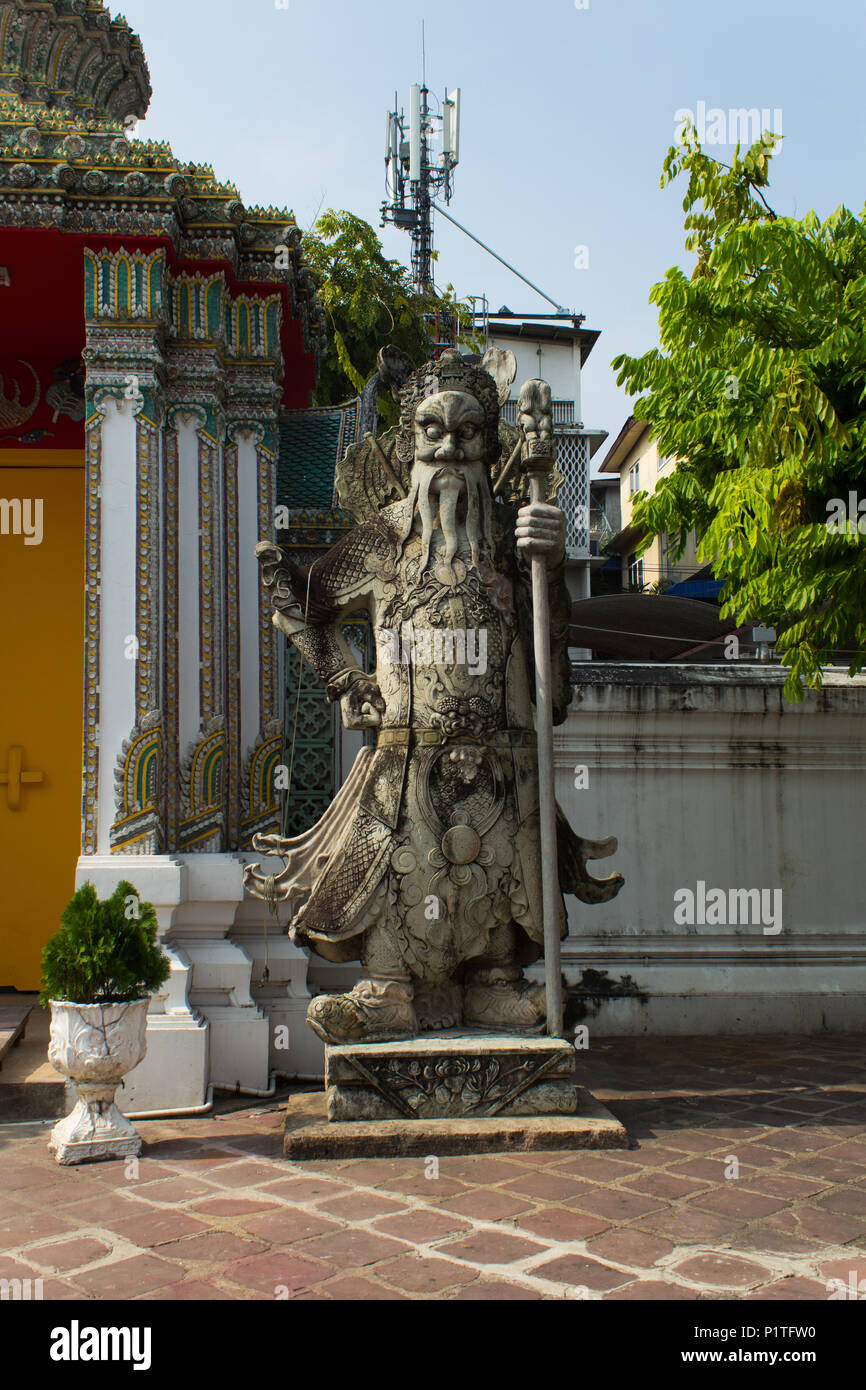 Bangkok, Thailand - Januar 2014: Chinesische guardian stone Statue in Wat Pho Tempel in Bangkok, Thailand Stockfoto