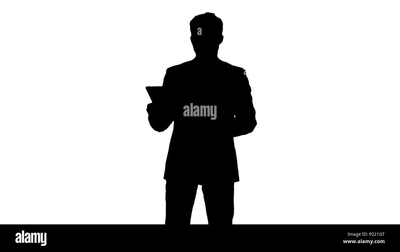 Silhouette Geschäftsmann mit seinem Tablet Stockfoto