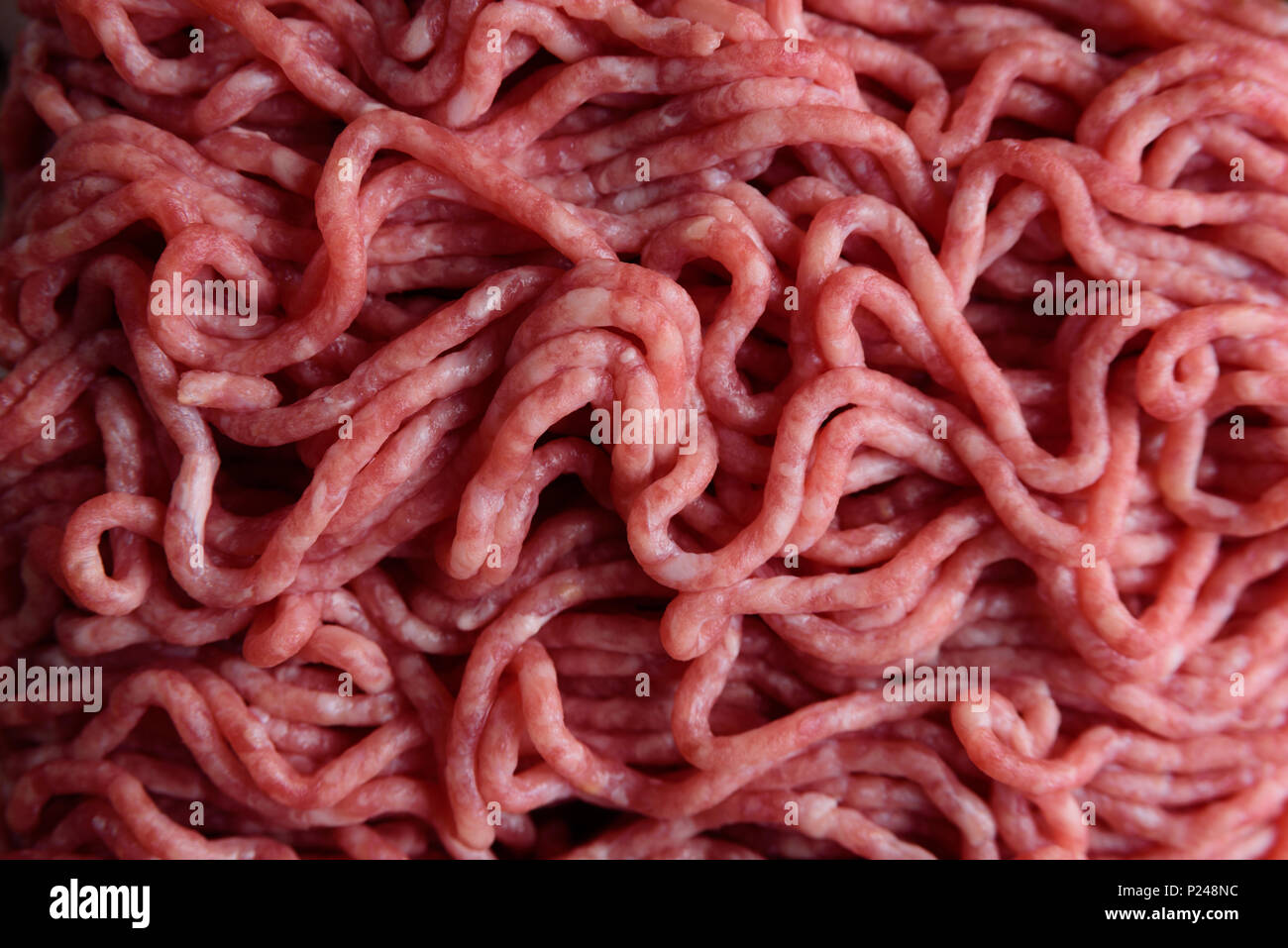 Rohes gehacktes Schweinefleisch Textur, Muster Stockfoto