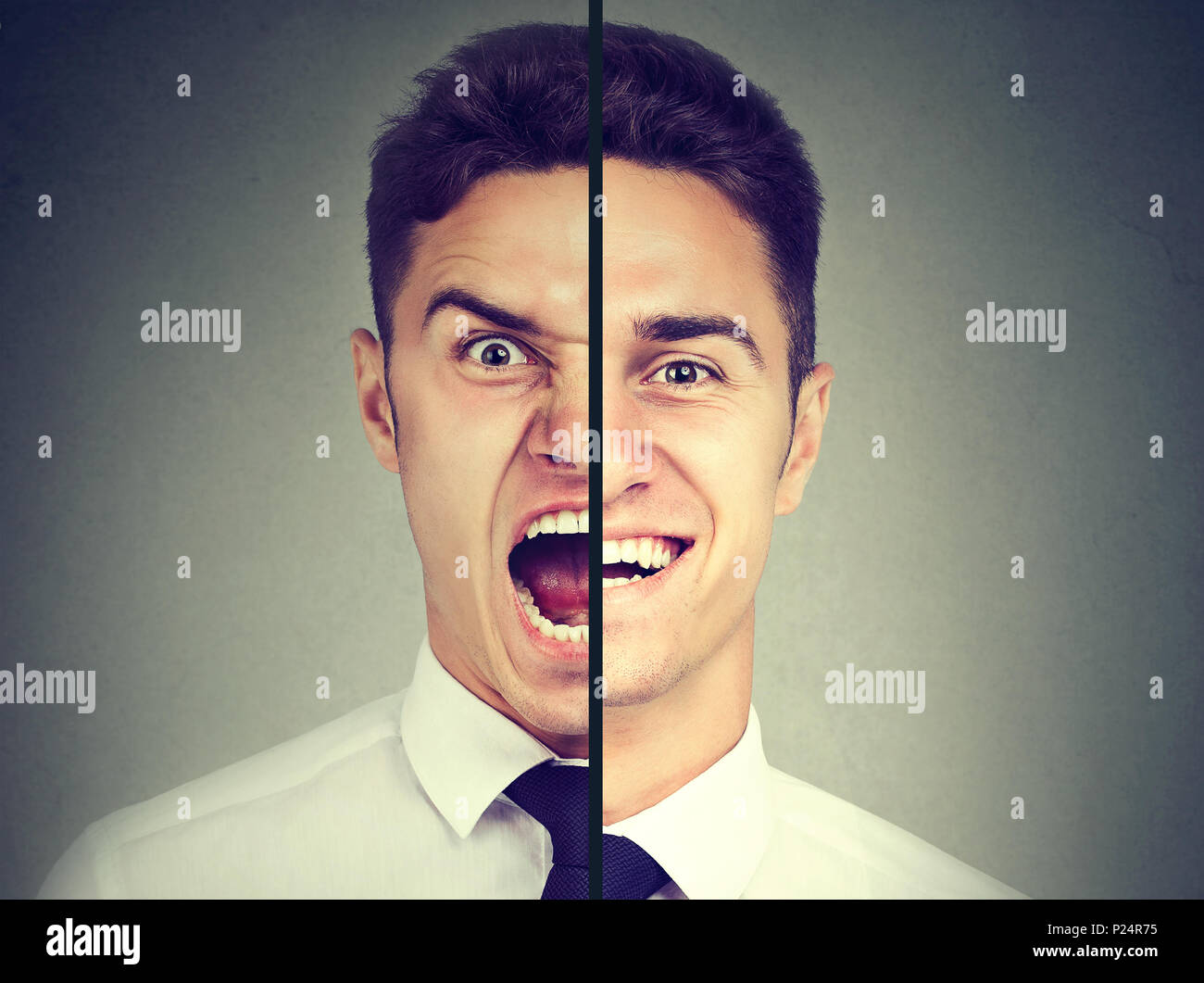 Bipolare Störung. Geschäftsmann mit einem Gesichtsausdruck auf grauem Hintergrund Stockfoto