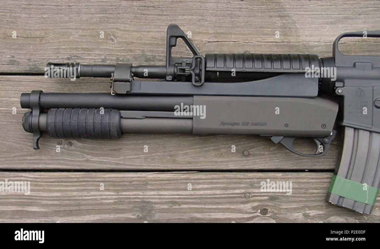 . Englisch: Der kac MasterKey unter dem Fass mit einem M4-Sturmgewehr angebracht. 19. April 2009. Der DrBaker M4Carbine.net 28 KAC MasterKey Stockfoto