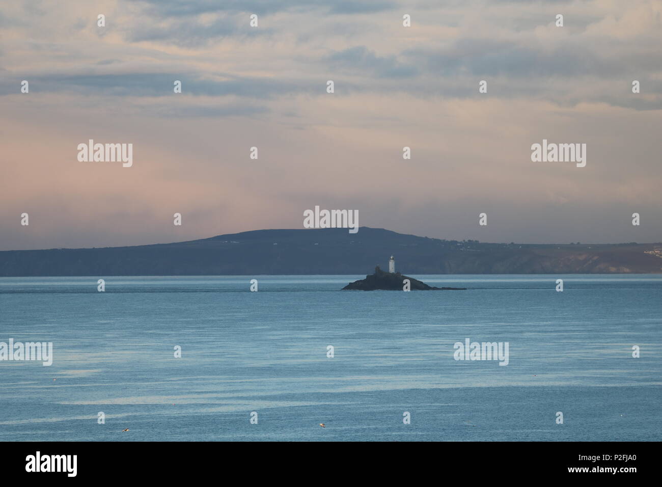 Godrevy Leuchtturm von St Ives, Cornwall, South West England, Vereinigtes Königreich. Winter Sonnenuntergang. Stockfoto