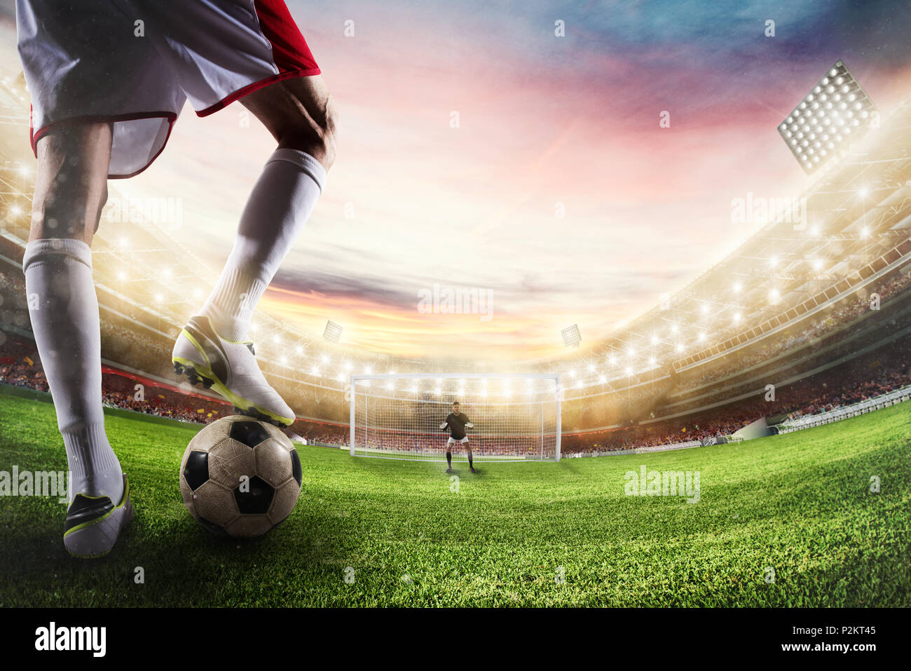 Fußball Stürmer bereit zu kickt den Ball vor Torwart. 3D-Rendering Stockfoto