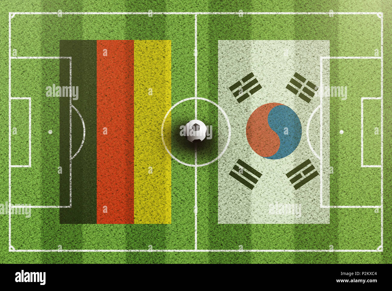 Blick von oben auf die grünen Fußballplatz mit Flaggen von Deutschland und Südkorea Stockfoto