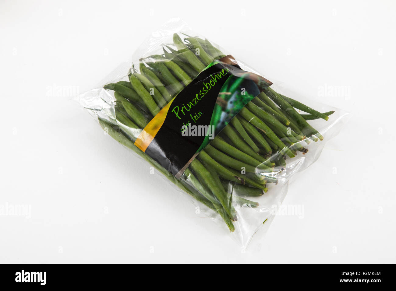 Frische Lebensmittel, Gemüse jeweils einzeln in Folie verpackt, das Essen wird im gleichen Supermarkt auch ohne Verpackungen aus Kunststoff, Bush verfügbar Stockfoto