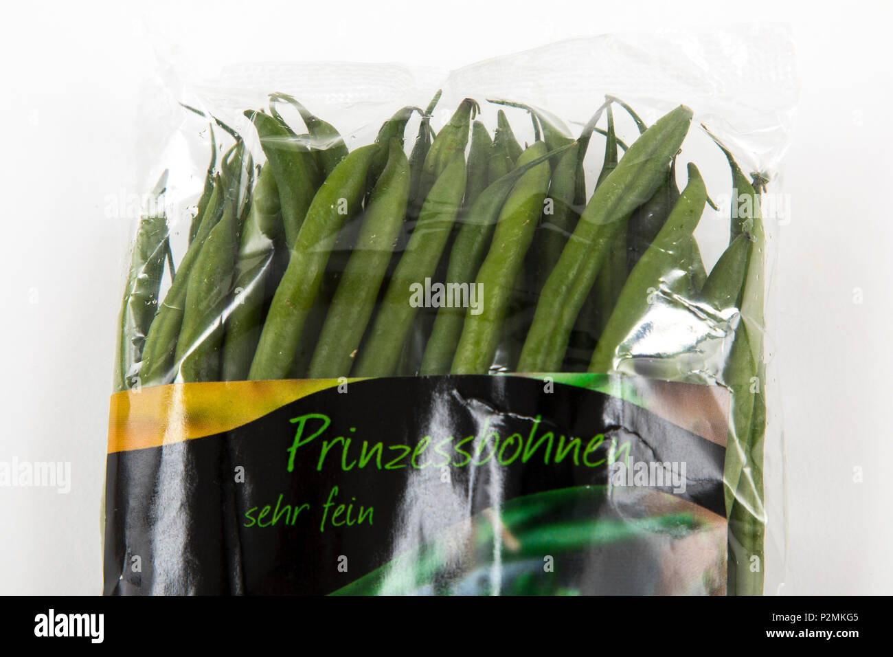 Frische Lebensmittel, Gemüse jeweils einzeln in Folie verpackt, das Essen wird im gleichen Supermarkt auch ohne Verpackungen aus Kunststoff, Bush verfügbar Stockfoto