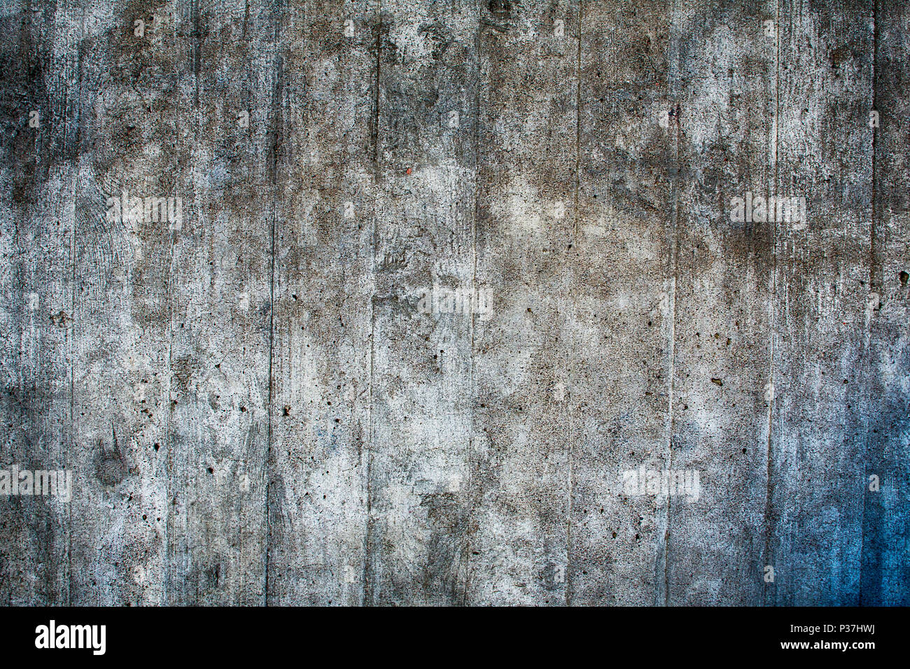 Nahaufnahme des rauen alten Betonwand mit Rissen und Muster. Stockfoto
