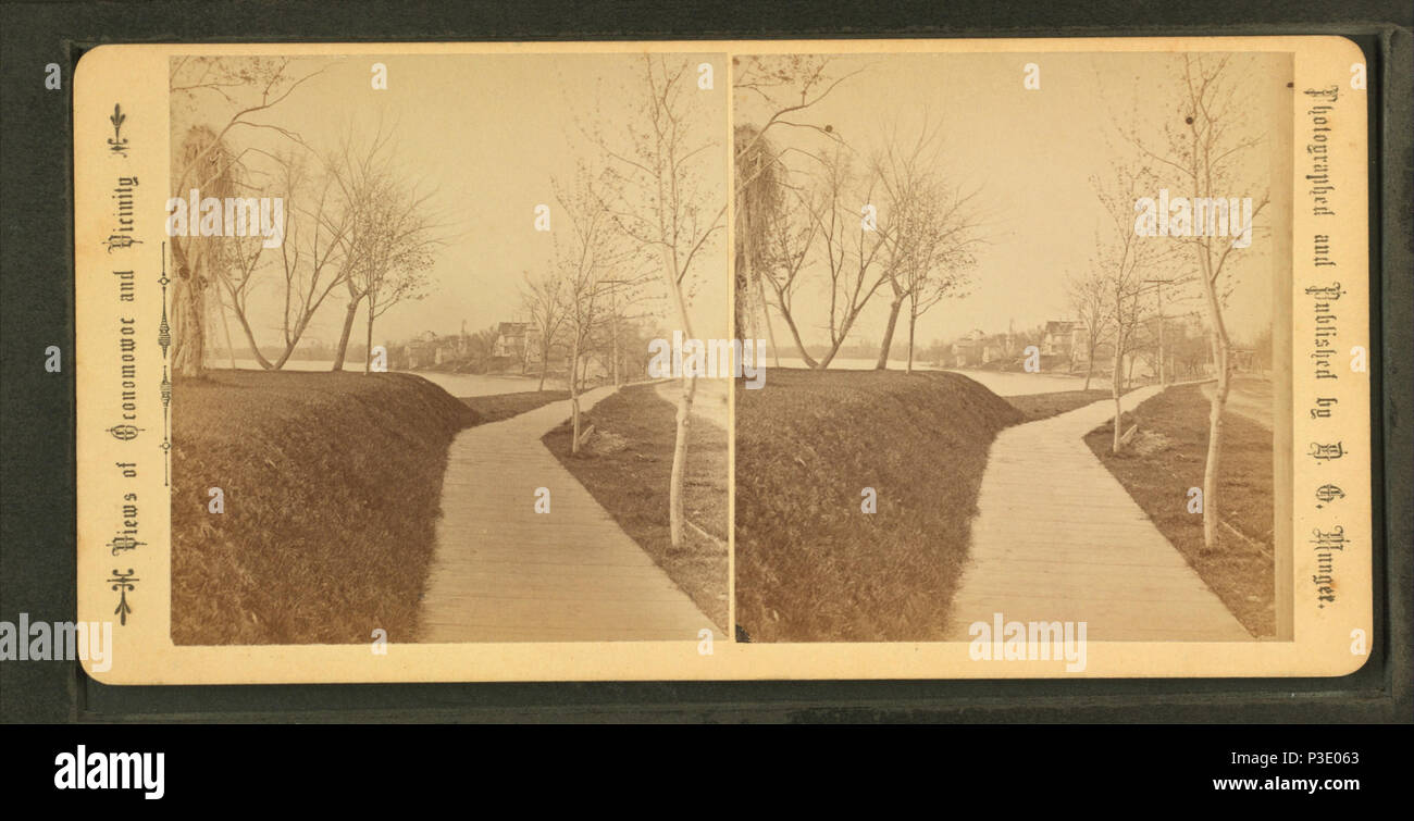 . Seite Spaziergang entlang des Sees. Alternative Titel: Blick auf Oconomovoc und Umgebung. Erstellt: Ca. 1885. Abdeckung: 1865?-1885?. Quelle Impressum: 1865?-1885?. Digitale Element veröffentlicht 1-28 2006; 4-23-2009 aktualisiert. 271 Seite Spaziergang entlang der See, von D.G. Munger Stockfoto