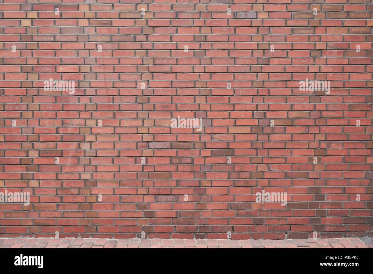 Brick Wall aus vielen roten Ziegeln als Hintergrund Textur Stockfoto