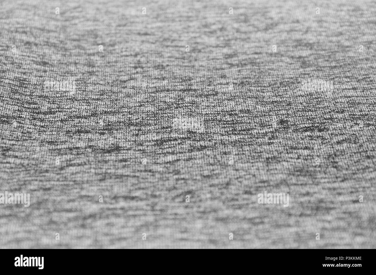 In der Nähe von Heizungs- und gestrickte Trikot stoffgemustert Hintergrund Tuch mit feiner Streifenstruktur. Stockfoto