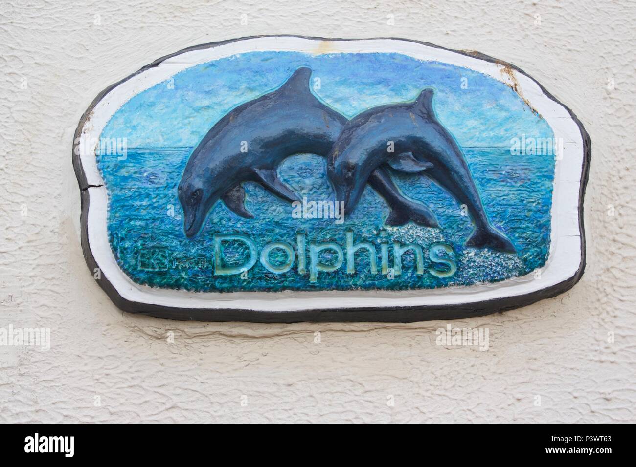 Ein blauer, Delphine home Gedenktafel in Teignmouth, South Devon, England gefunden Stockfoto