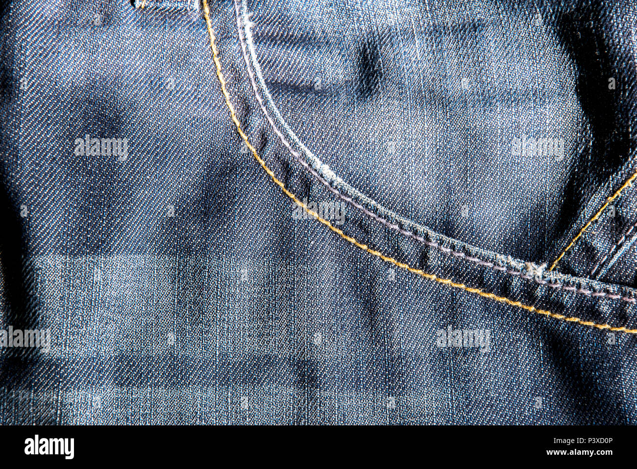 Glatte Oberfläche ist einen interessanten Hintergrund für die Erstellung von Medien Design, Jeans Dunkelblau zeigen Stärke zu arbeiten, einen guten Stil Blick ist interessant, die o Stockfoto