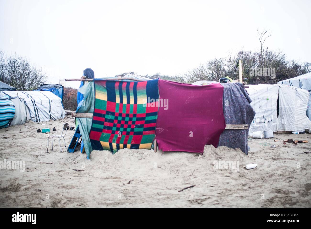 Campo de Calais - a Vida Na Selva realizada No Campo de refugiados keine Norte da França. Stockfoto