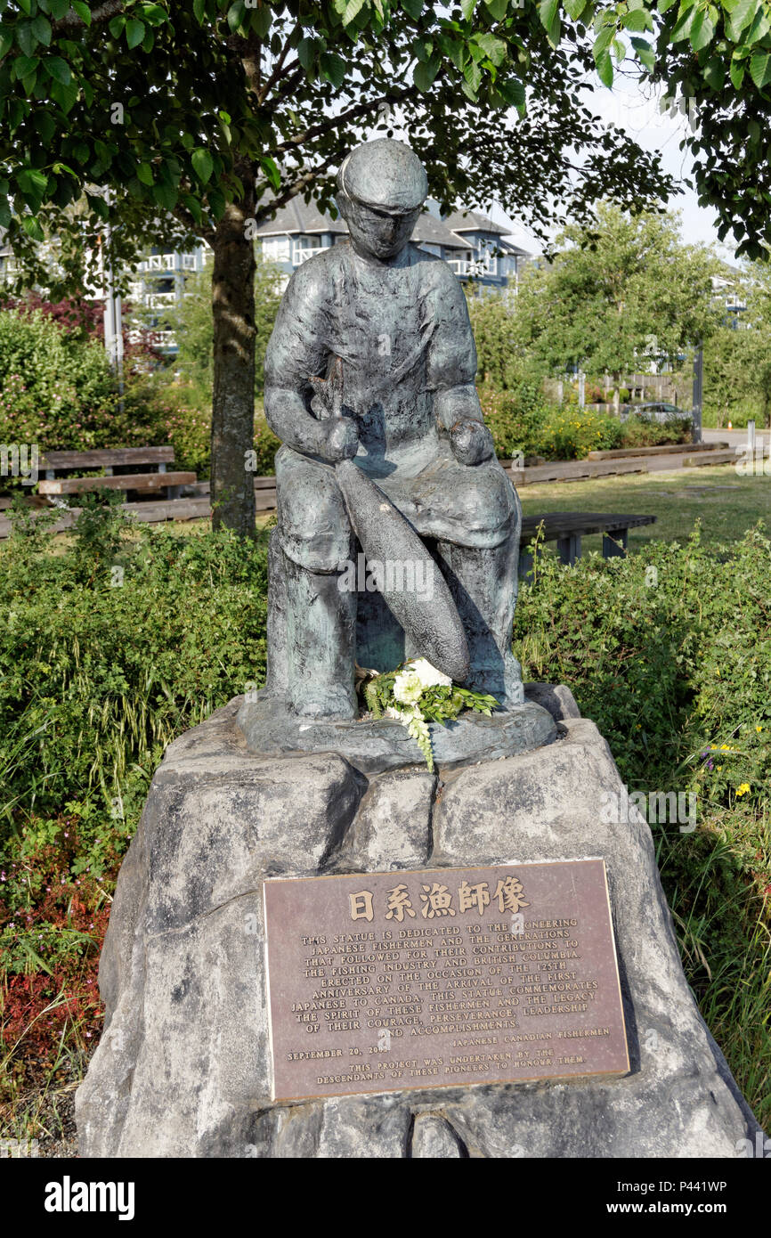 Schwarz Bronze Japanische Fischer's Memorial Statue in der Britannia Erbe Werft, Steveston, Richmond, British Columbia, Kanada Stockfoto