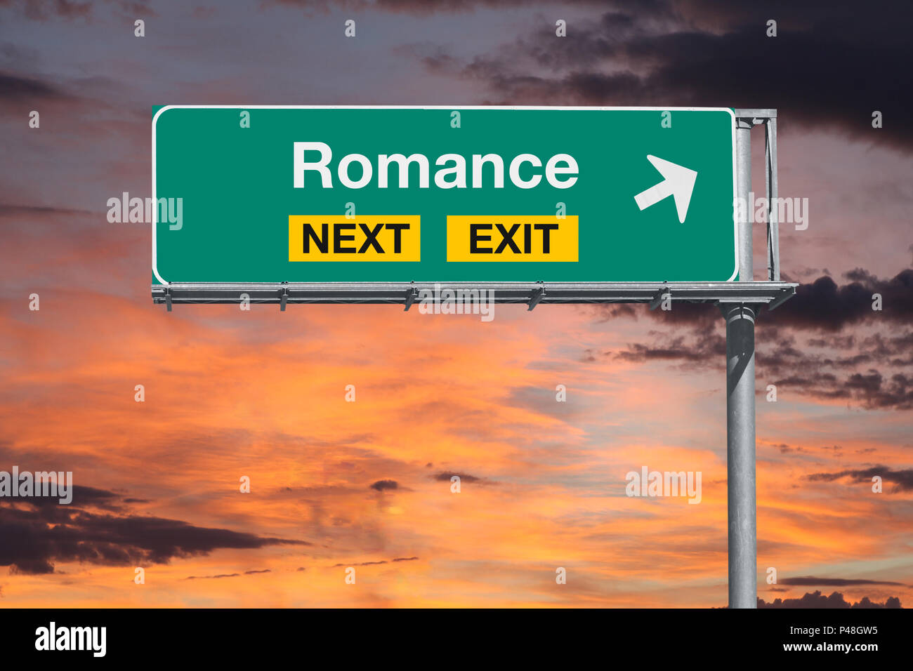 Romantik nächste Ausfahrt Autobahn Schild mit Sonnenuntergang Himmel. Stockfoto