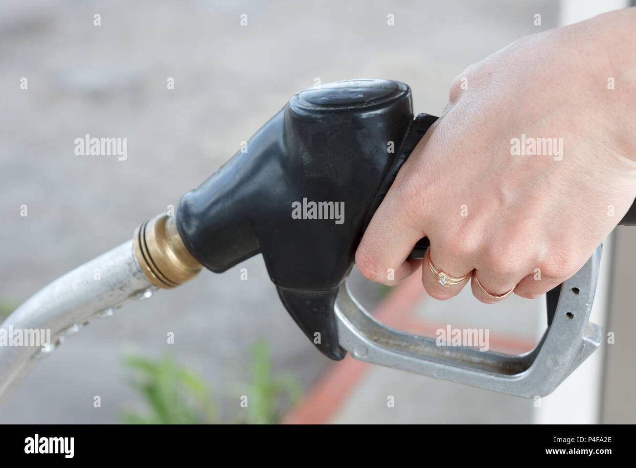 Benzin nachfüllen Pistole Stockfoto
