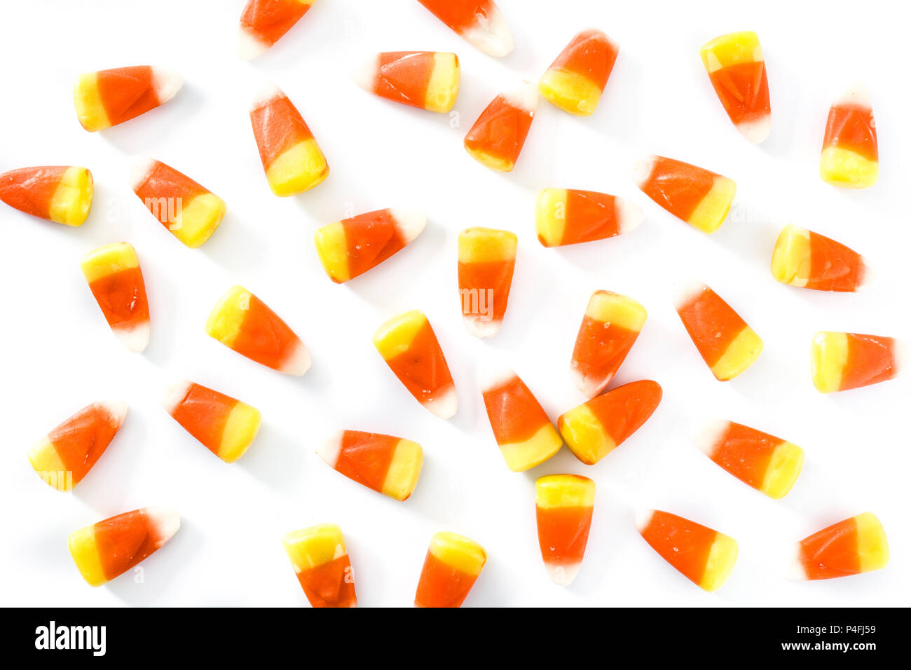 Typische Halloween Candy corn Muster auf weißem Hintergrund. Stockfoto