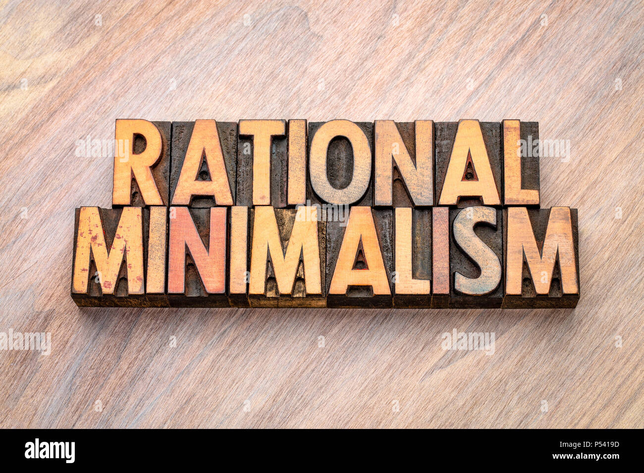 Rationale Minimalismus - word Abstract in Vintage buchdruck Holz Art Klischees Stockfoto