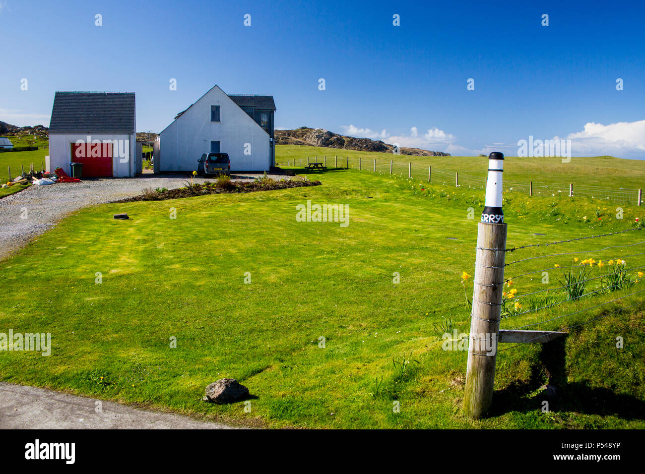 Das Haus namens Skerryvore liegt auf der Grenze des machair auf der Hebriden Insel Iona, Argyll und Bute, Schottland, Großbritannien Stockfoto